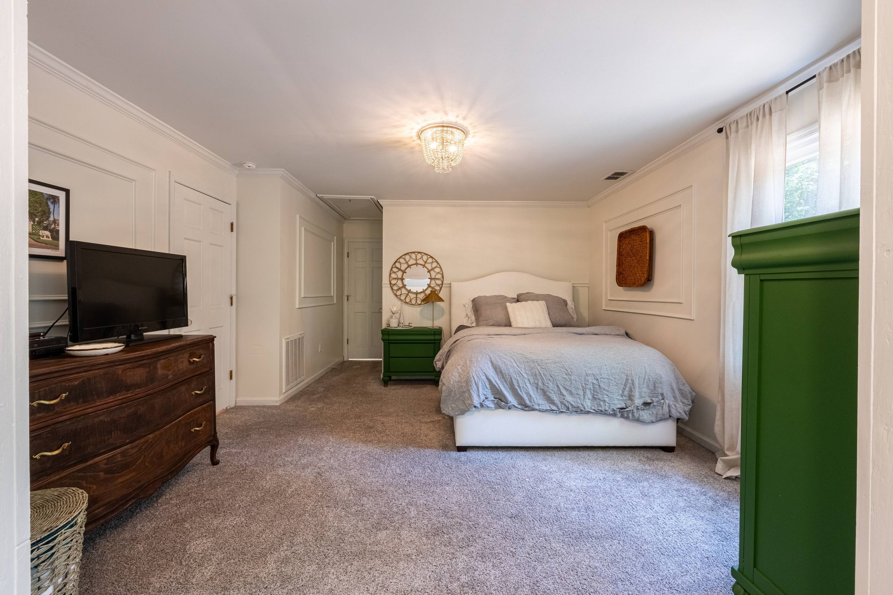 396 Cardinal Lane Toccoa, GA 30577 - Photo 32 of 103 a bedroom with a bed and a flat screen tv