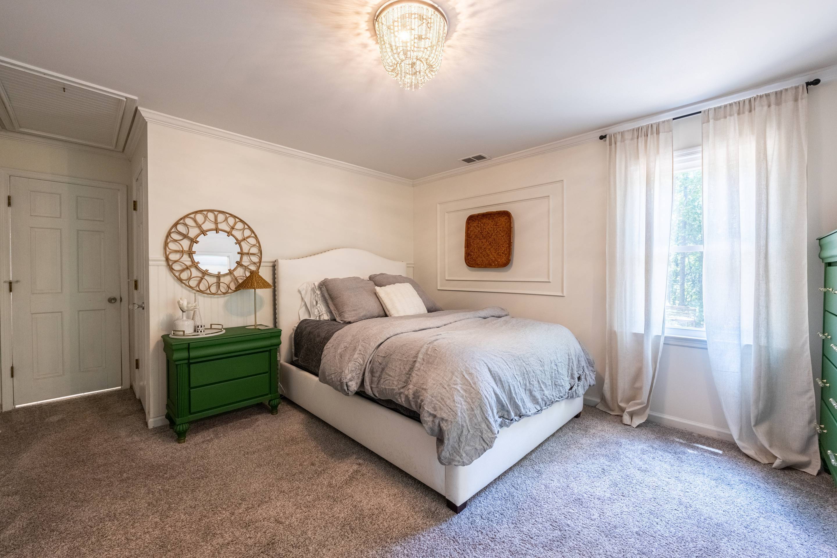 396 Cardinal Lane Toccoa, GA 30577 - Photo 33 of 103 a spacious bedroom with a bed and a large window