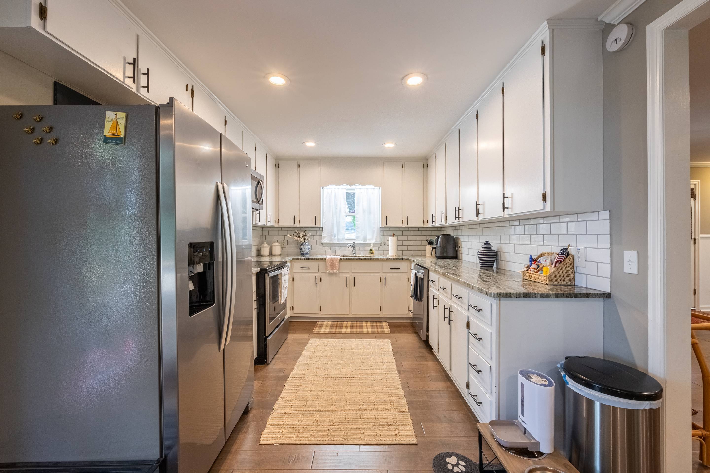 396 Cardinal Lane Toccoa, GA 30577 - Photo 43 of 103 a kitchen with stainless steel appliances granite countertop a refrigerator and a stove top oven