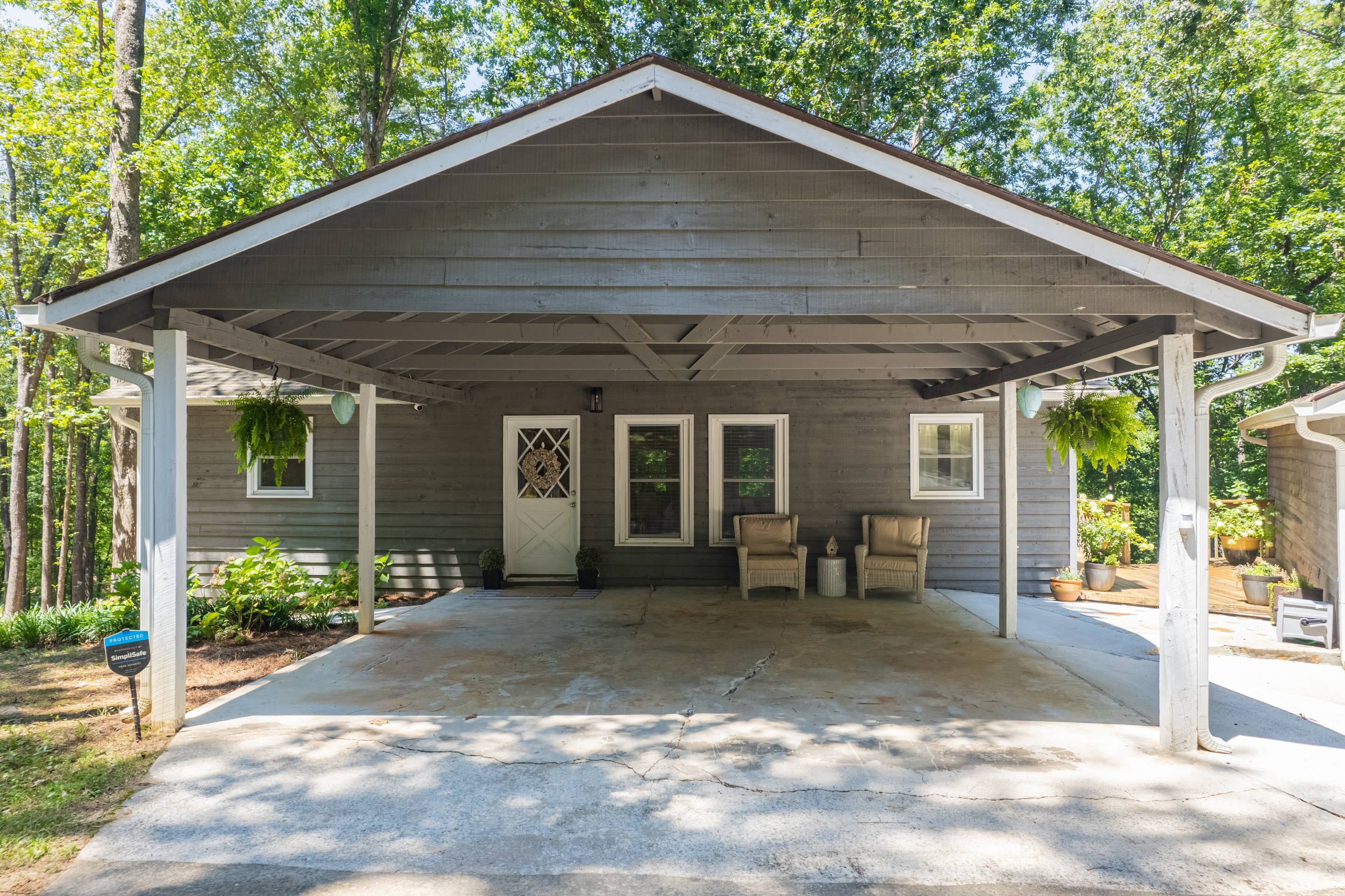 396 Cardinal Lane Toccoa, GA 30577 - Photo 5 of 103 a front view of a house with garden