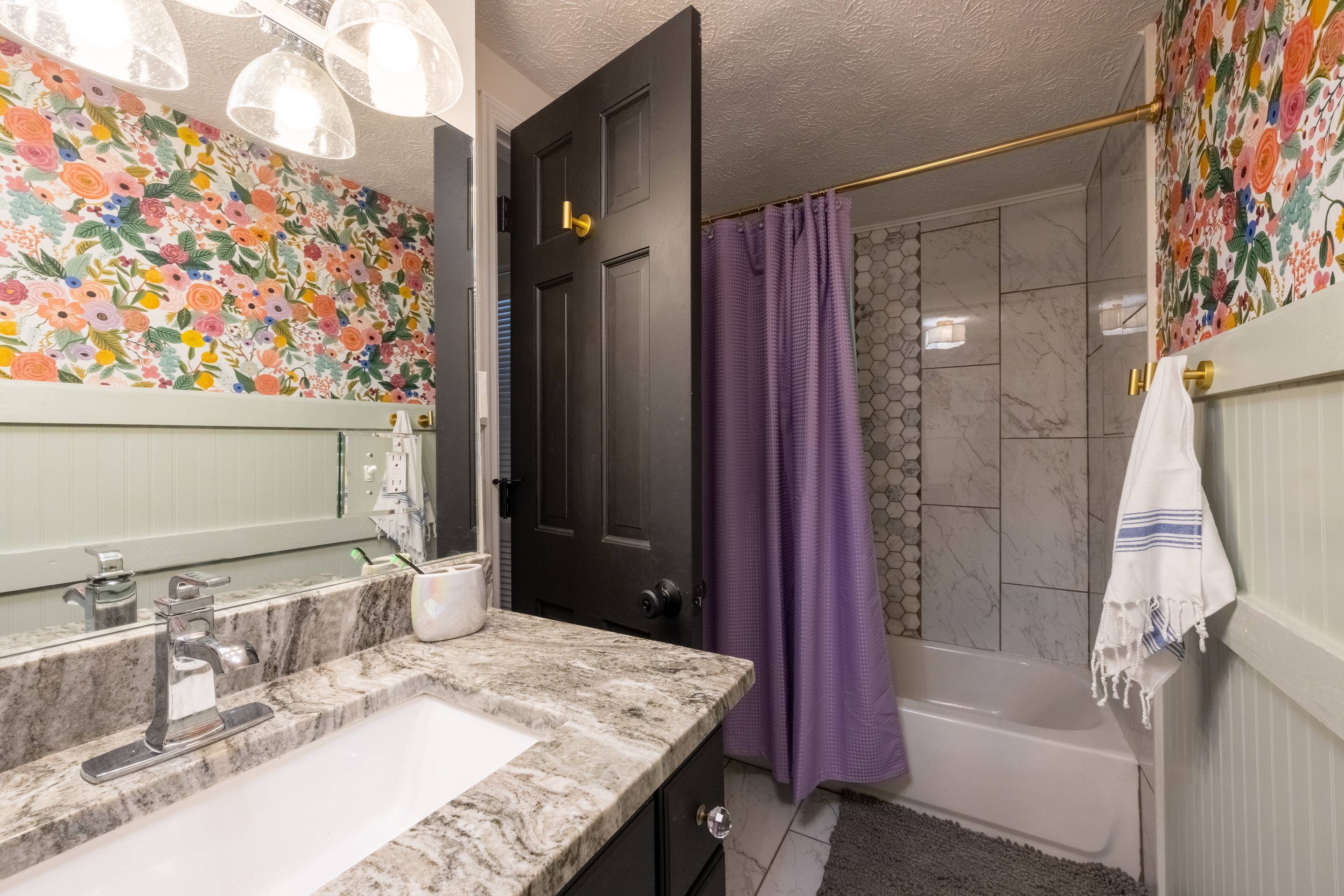 396 Cardinal Lane Toccoa, GA 30577 - Photo 63 of 103 a bathroom with a granite countertop sink a mirror and shower