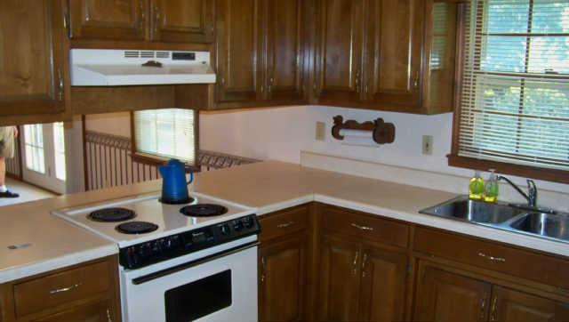 689 Ghea Road Normandy, TN 37360 - Photo 5 of 19 a kitchen with a sink and cabinets