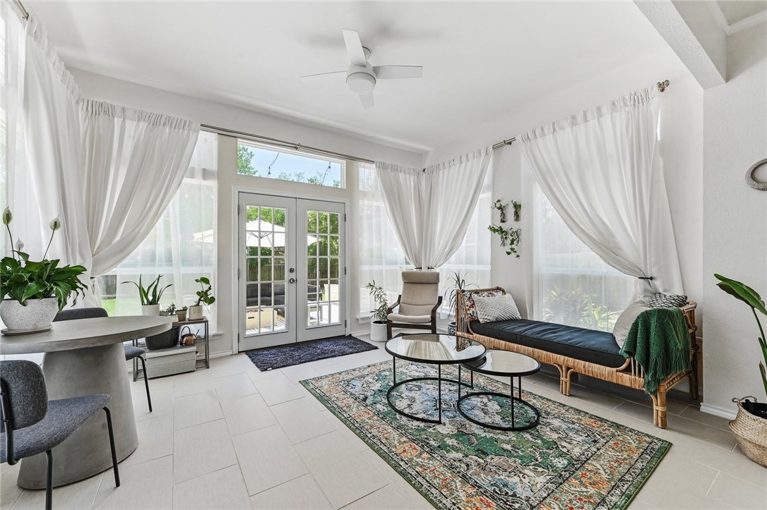 8913 Lanna Bluff Loop Austin, TX 78749 - Photo 1 of 1 a living room with furniture and a large window