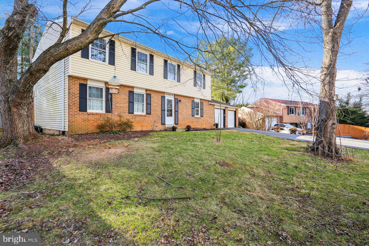 19019 Quail Valley Boulevard Gaithersburg, MD 20879 - Photo 1 of 31 a view of a house with a yard