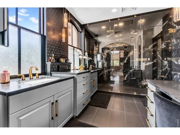 a open kitchen with sink and cabinets