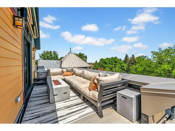 a view of a chairs and table in the patio
