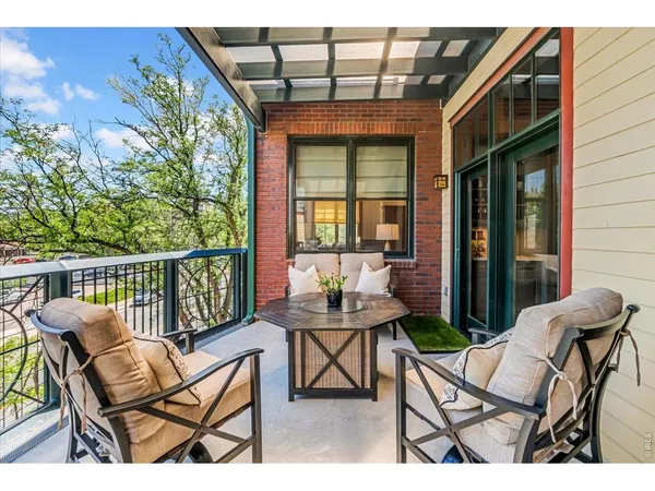 a front view of a house with lots of yellow lighting