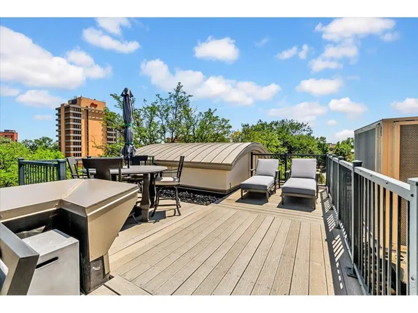 a view of a terrace with sitting area