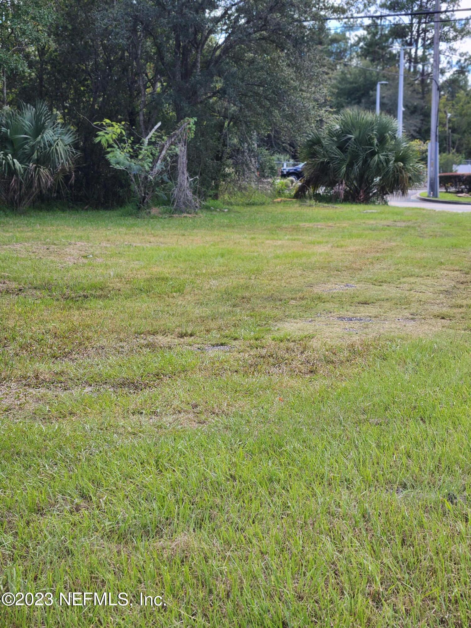 5314 Bowden Road Jacksonville, FL 32216 - Photo 11 of 17 a view of a field with an trees