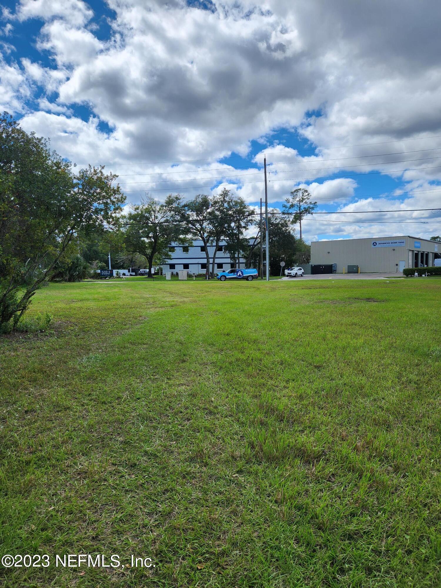 5314 Bowden Road Jacksonville, FL 32216 - Photo 15 of 17 a view of a green field