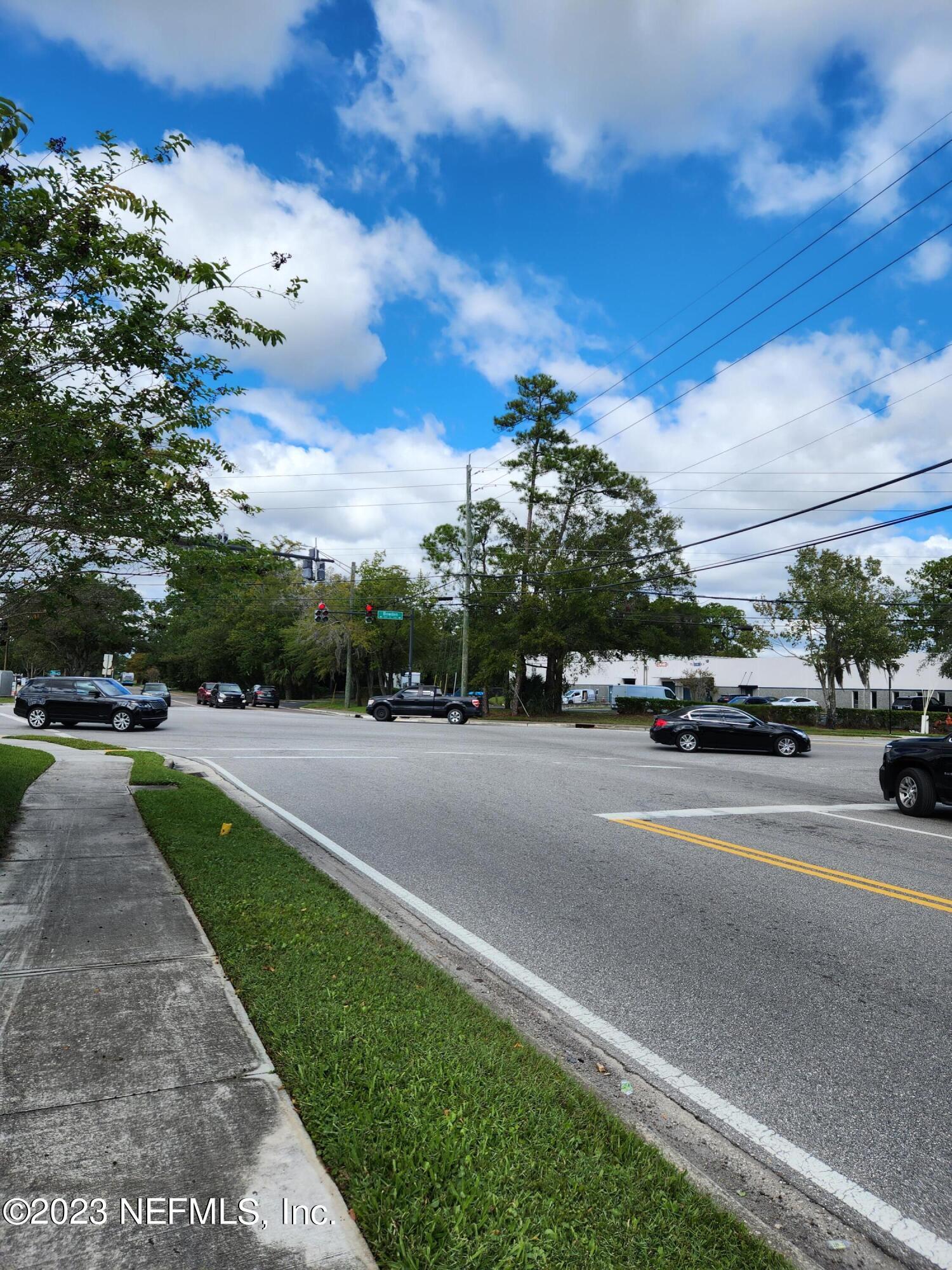 5314 Bowden Road Jacksonville, FL 32216 - Photo 16 of 17 a view of street with parked cars