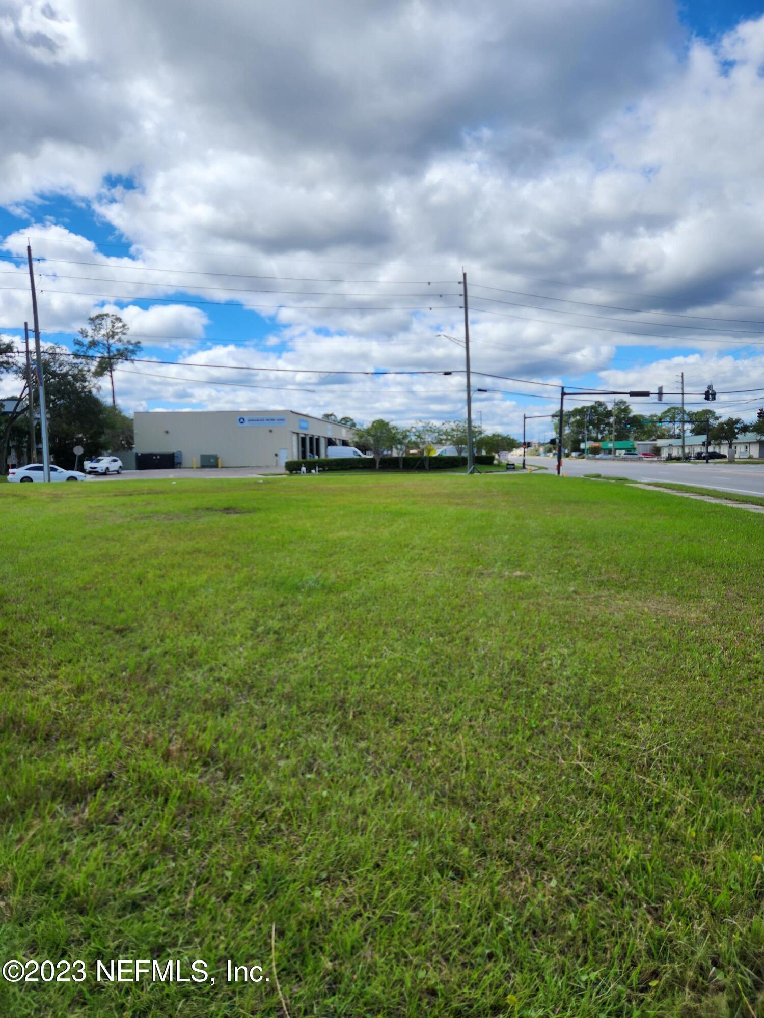 5314 Bowden Road Jacksonville, FL 32216 - Photo 10 of 17 a view of a field with a big yard