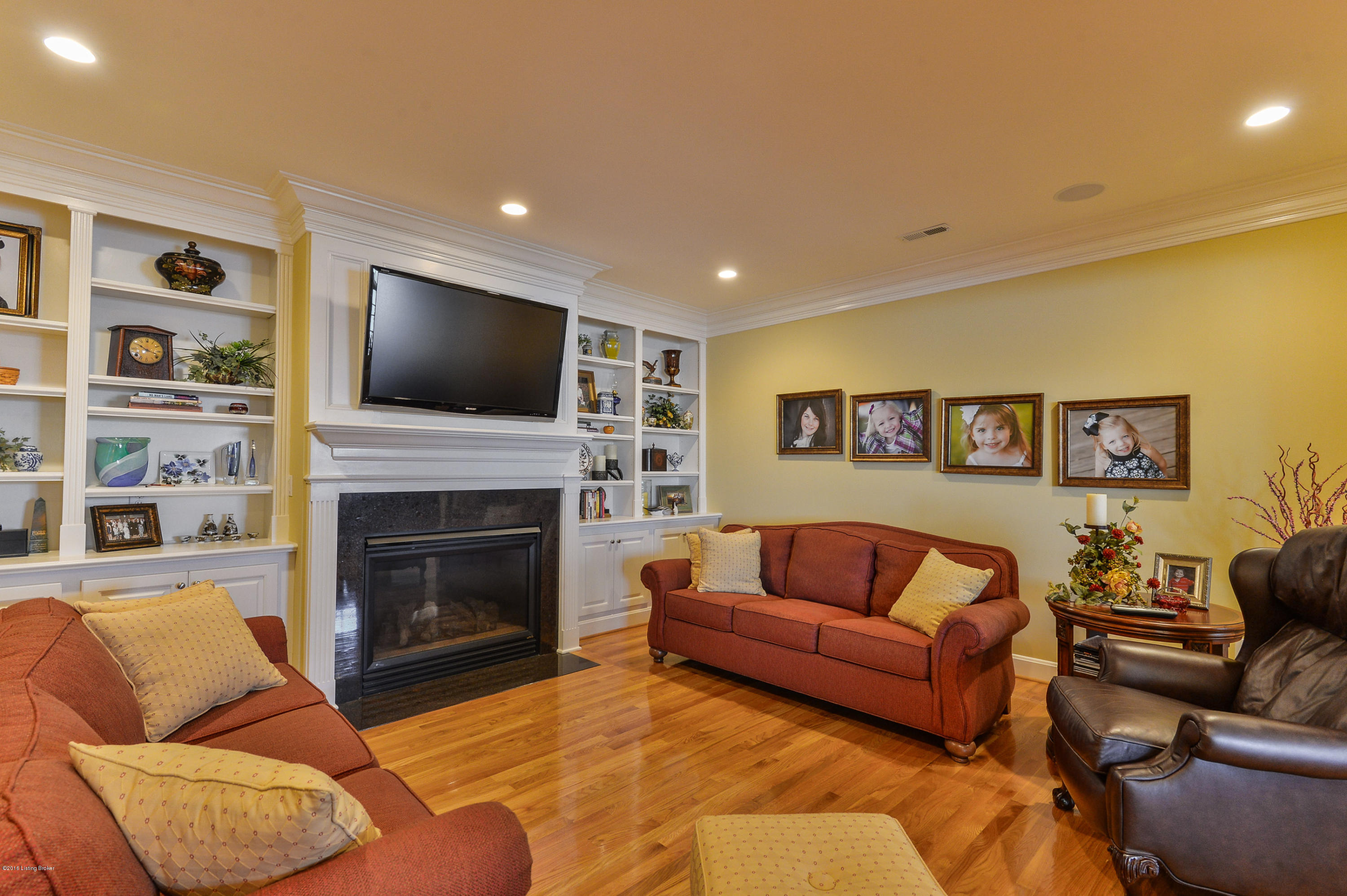 5307 Juniper Beach Road Prospect, KY 40059 - Photo 14 of 47 Family room has gas fireplace and built-in book cases