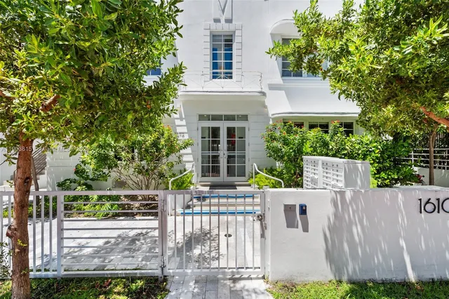 front view of a house with a small yard