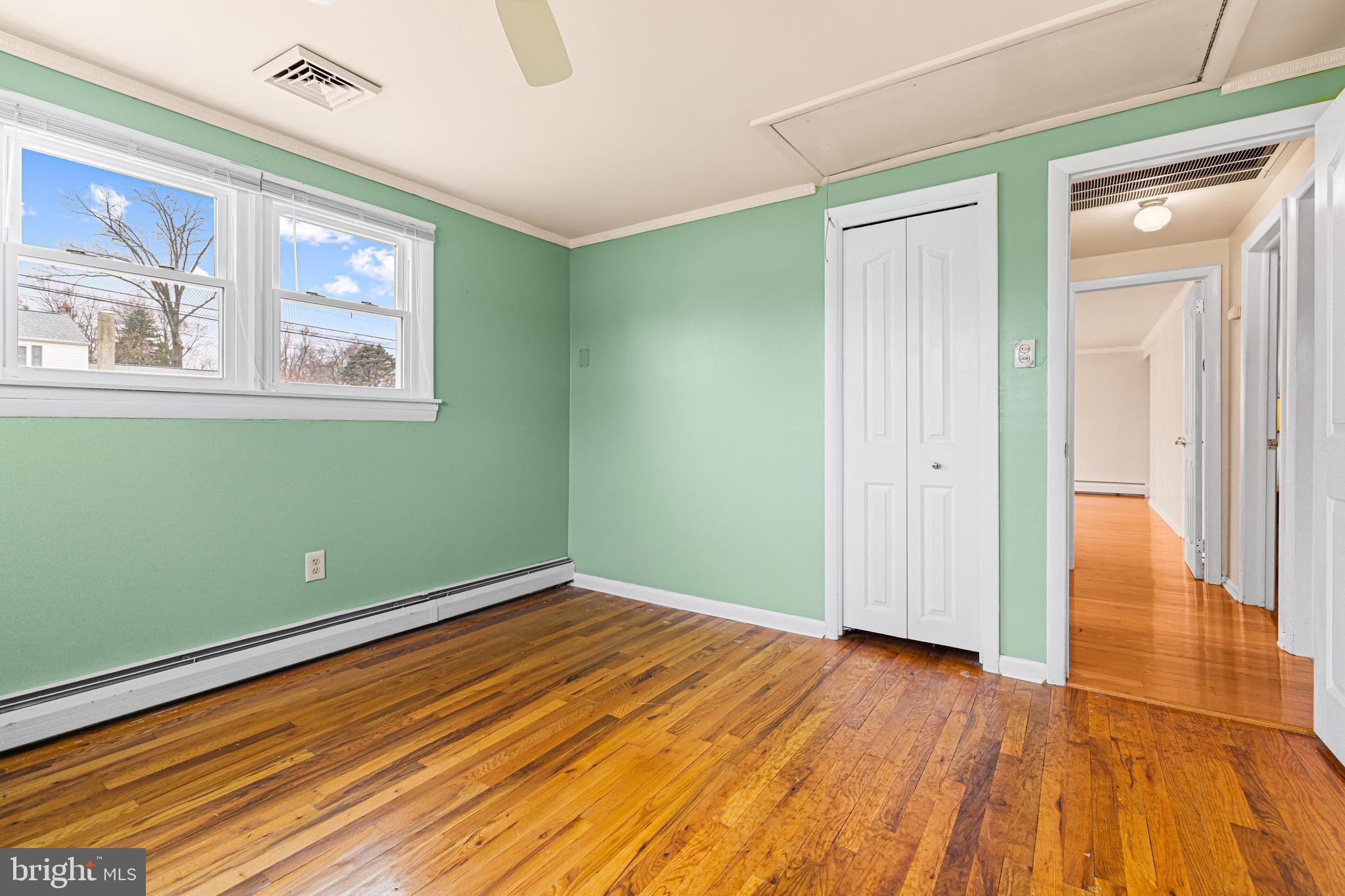 1413 Foster Road Warminster, PA 18974 - Photo 20 of 30 a view of a room with wooden floor and windows