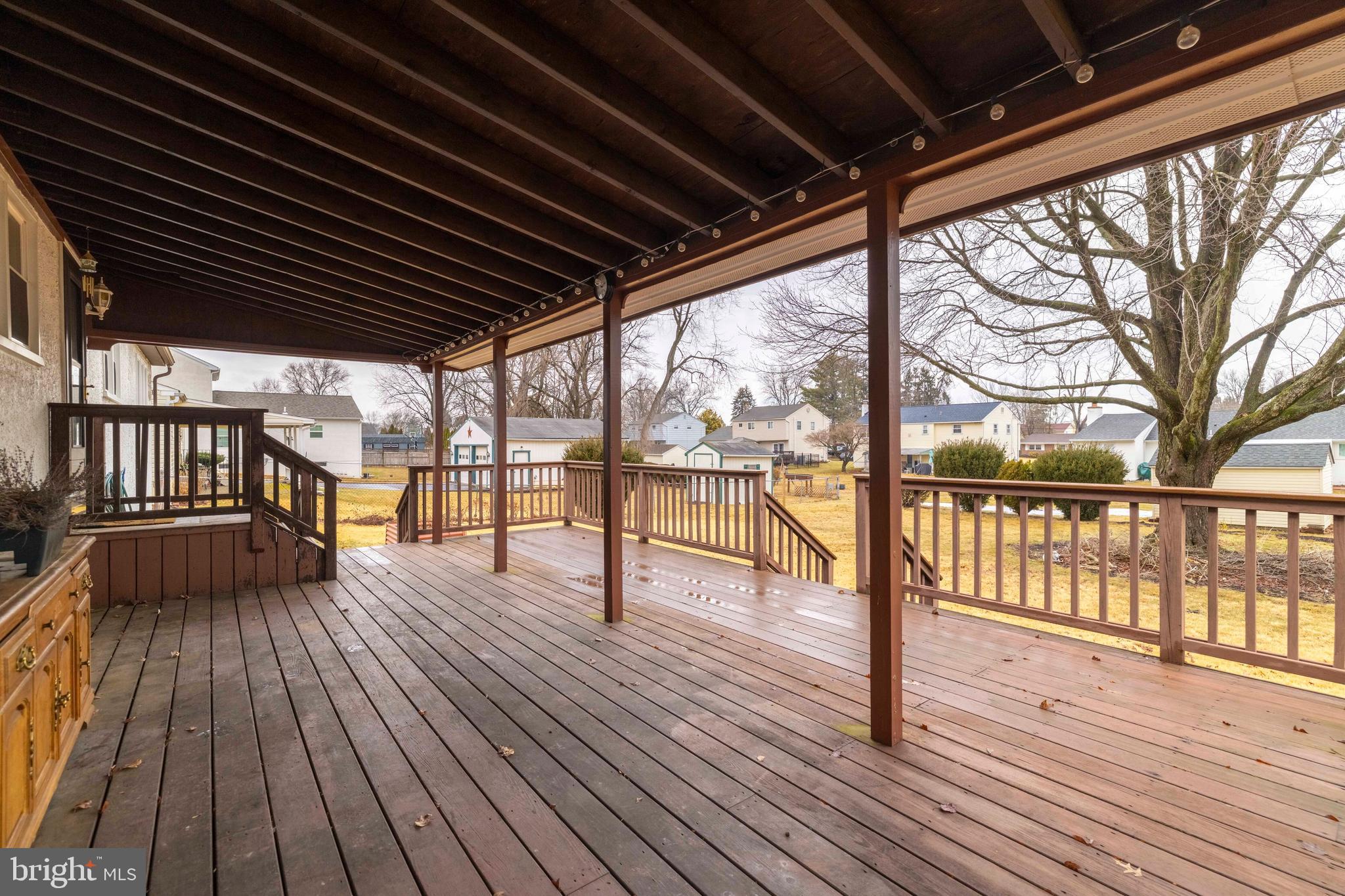 1413 Foster Road Warminster, PA 18974 - Photo 25 of 30 a view of porch with deck and wooden floor