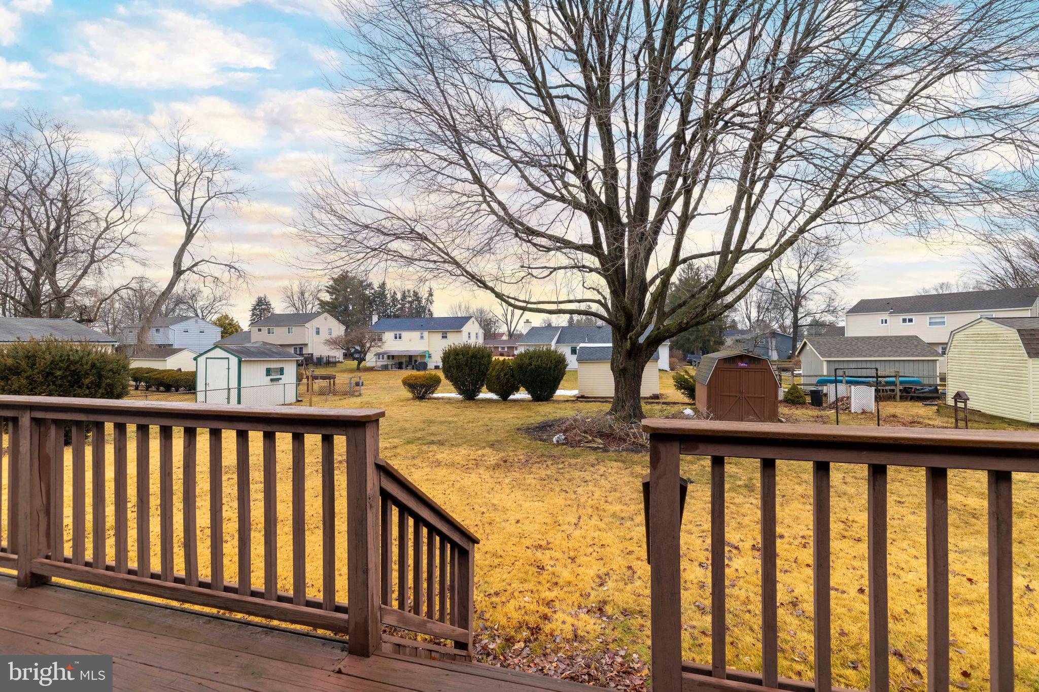 1413 Foster Road Warminster, PA 18974 - Photo 26 of 30 a view of a street with trees in front of it