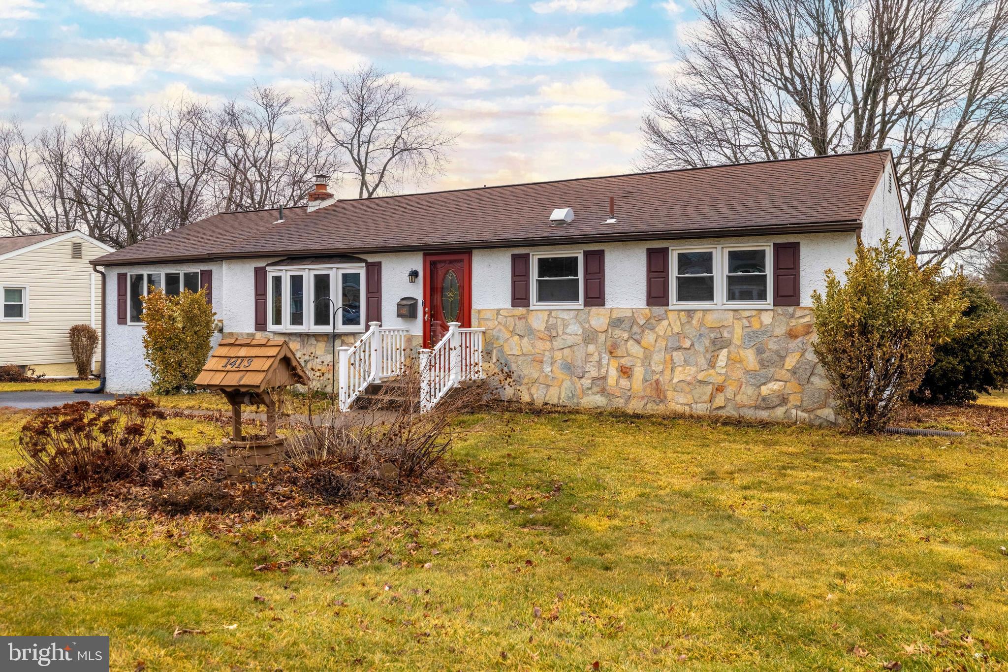 1413 Foster Road Warminster, PA 18974 - Photo 3 of 30 a front view of a house with a yard table and chairs