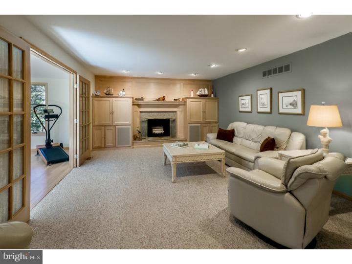 2 Carol Joy Road Medford, NJ 08055 - Photo 14 of 25 a living room with furniture and a fireplace