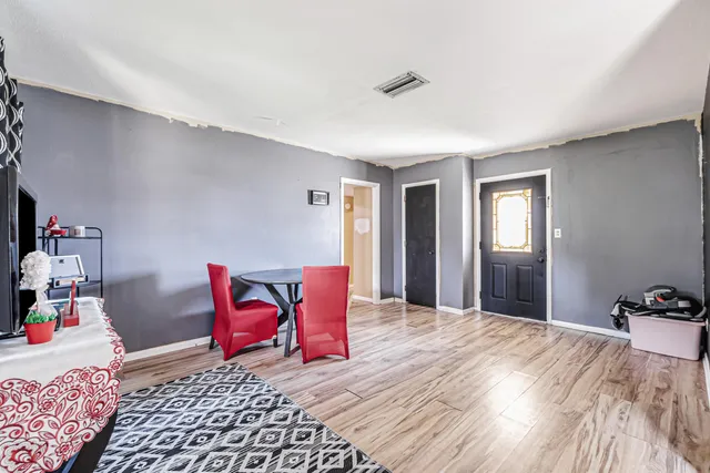 a workspace with furniture and window