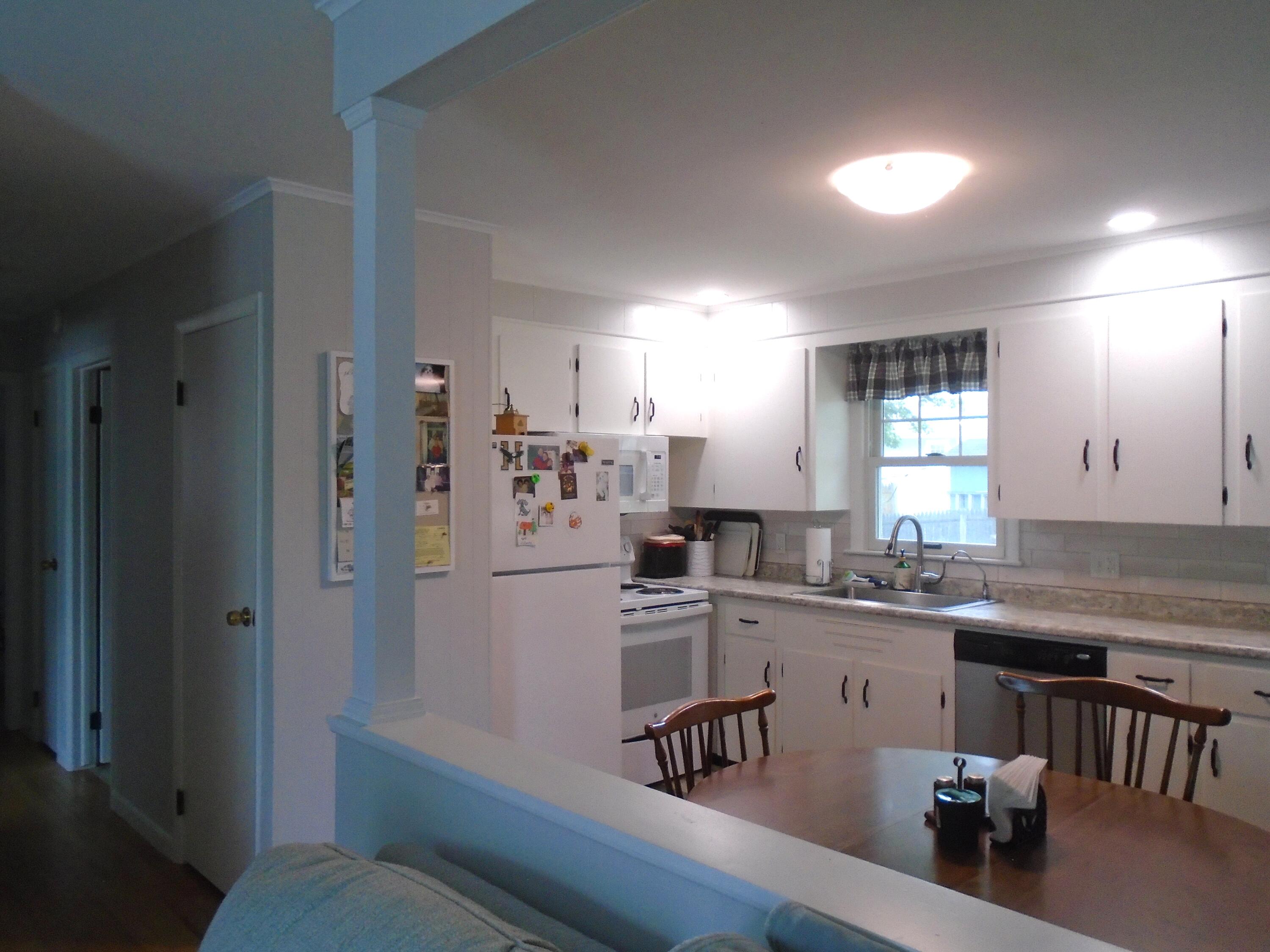17 Sam Street Winslow, ME 04901 - Photo 9 of 29 Living Room into Kitchen