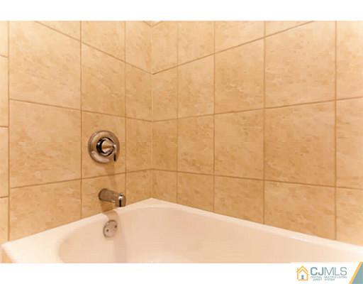 1991 Oak Tree Road Edison, NJ 08820 - Photo 12 of 20 a bathroom with a sink