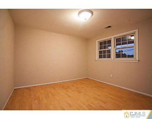 1991 Oak Tree Road Edison, NJ 08820 - Photo 16 of 20 a view of an empty room with a window