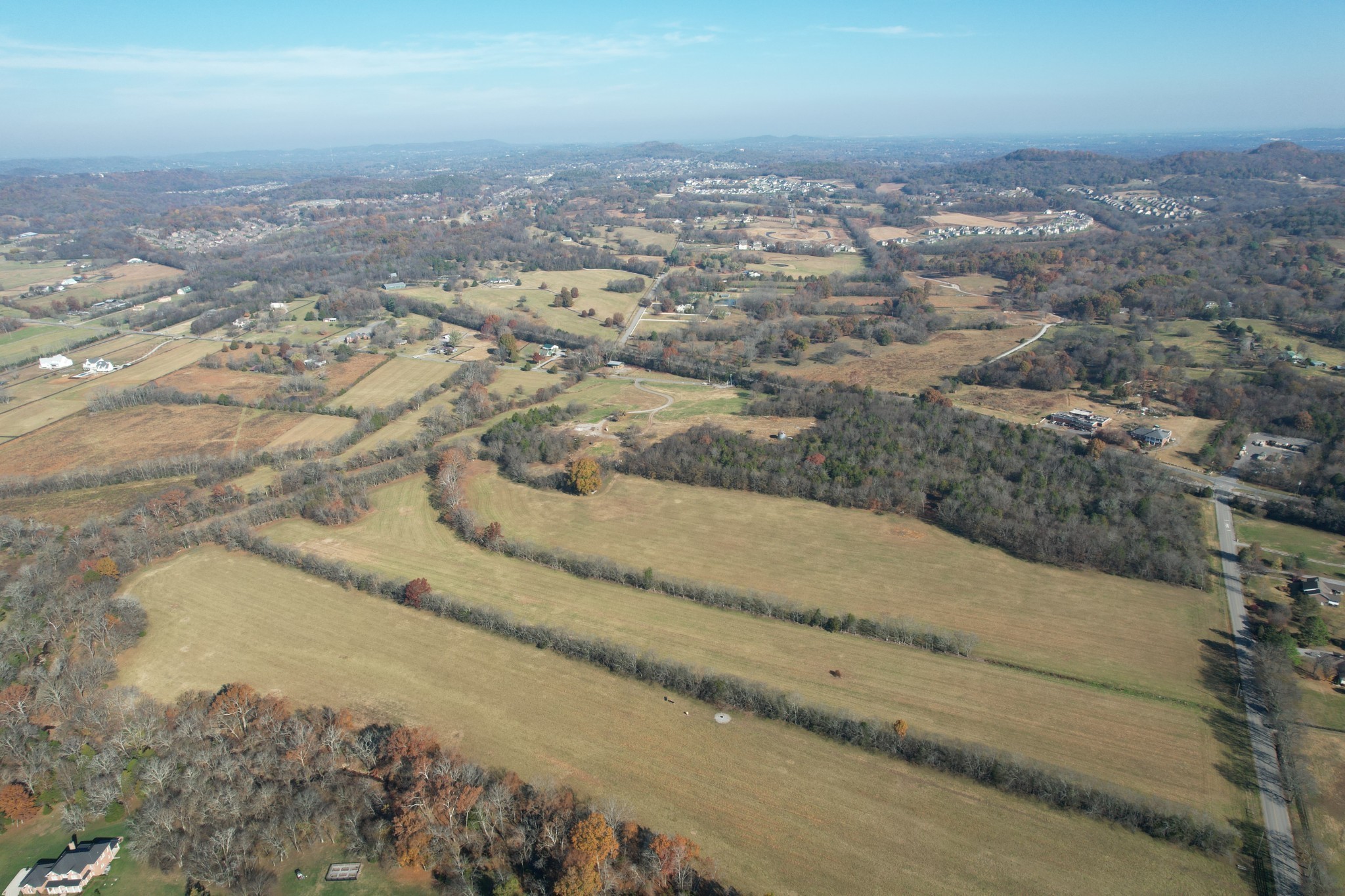 an aerial view of house with yard