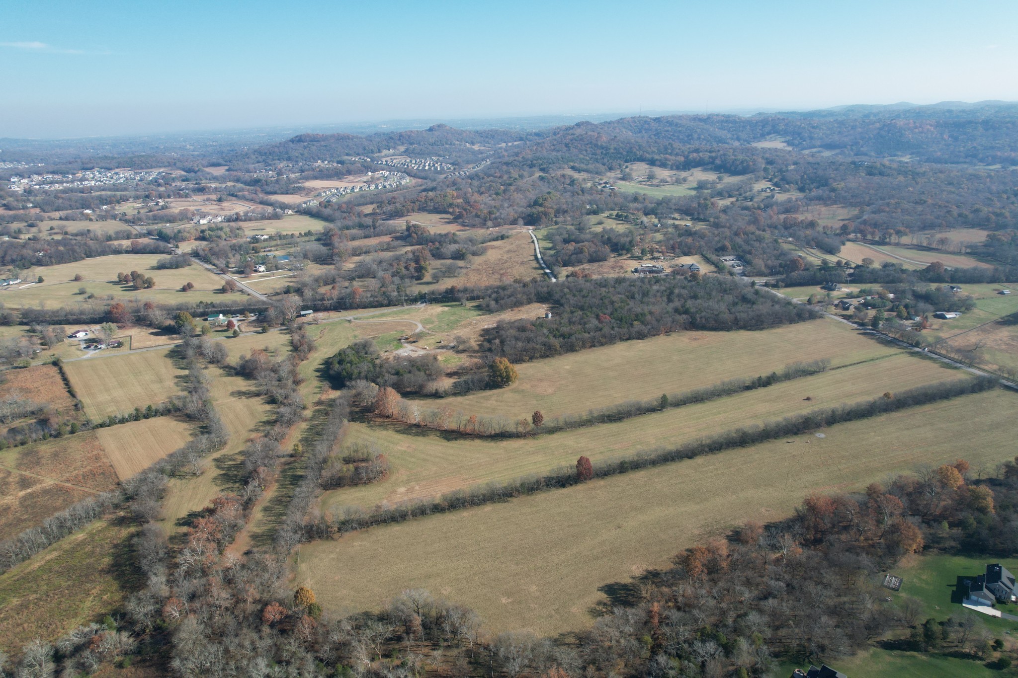 5 Trinity Road Franklin, TN 37067 - Photo 13 of 13 an aerial view of a house with a mountain