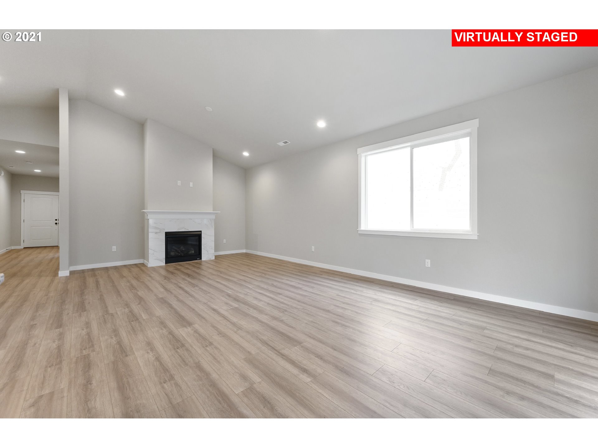 8719 North 5th Street, Unit LT50 Ridgefield, WA 98642 - Photo 27 of 31 a view of empty room with wooden floor