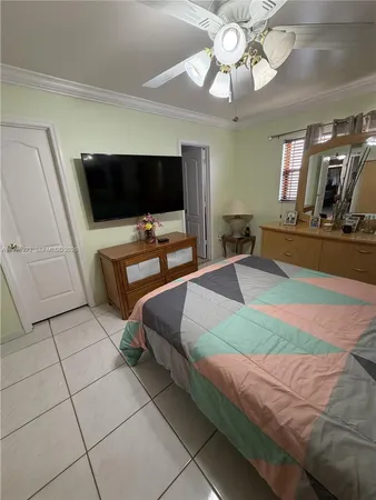 a bathroom with a sink mirror vanity and toilet