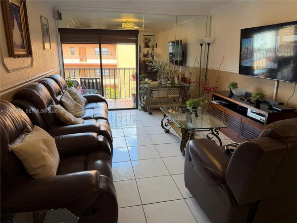 a view of a workspace with furniture