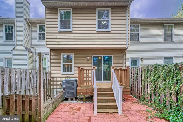 a view of a house with entrance and a window