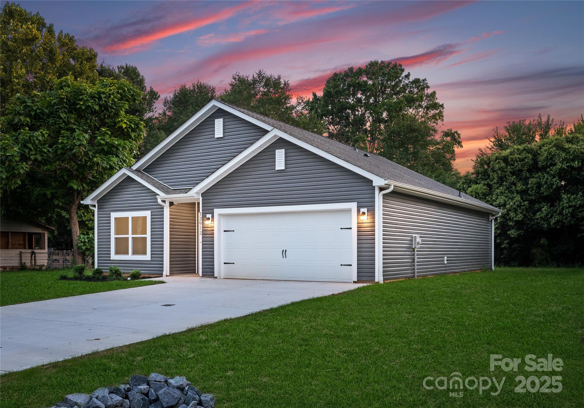 602 Westover Street Gastonia, NC 28054 - Photo 2 of 20 a view of a house with a yard and large tree