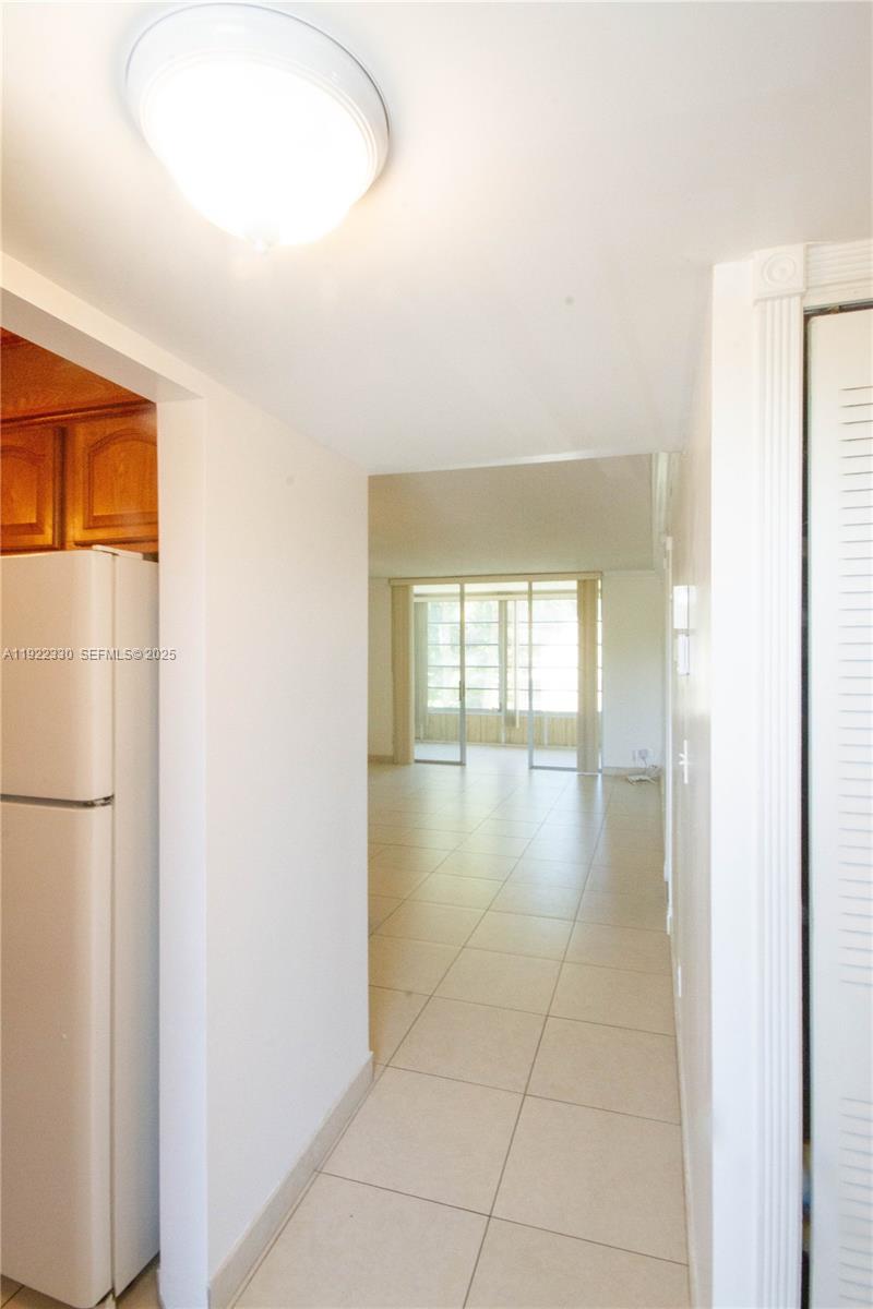 3000 Northwest 48th Terrace, Unit 322 Lauderdale Lakes, FL 33313 - Photo 2 of 15 a view of an empty room and window