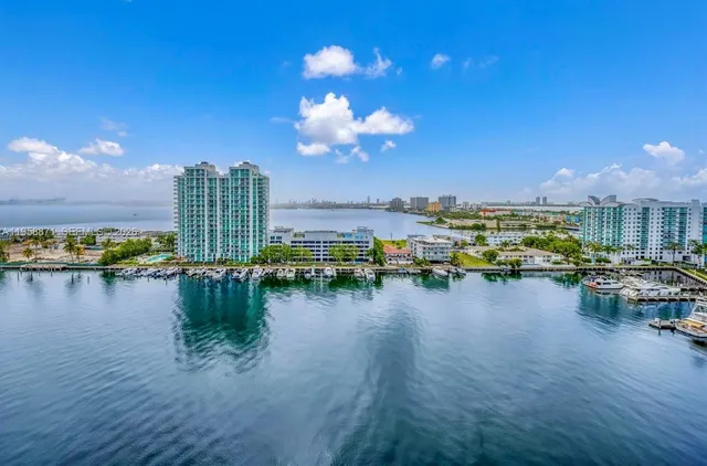 a view of a lake with outside a house