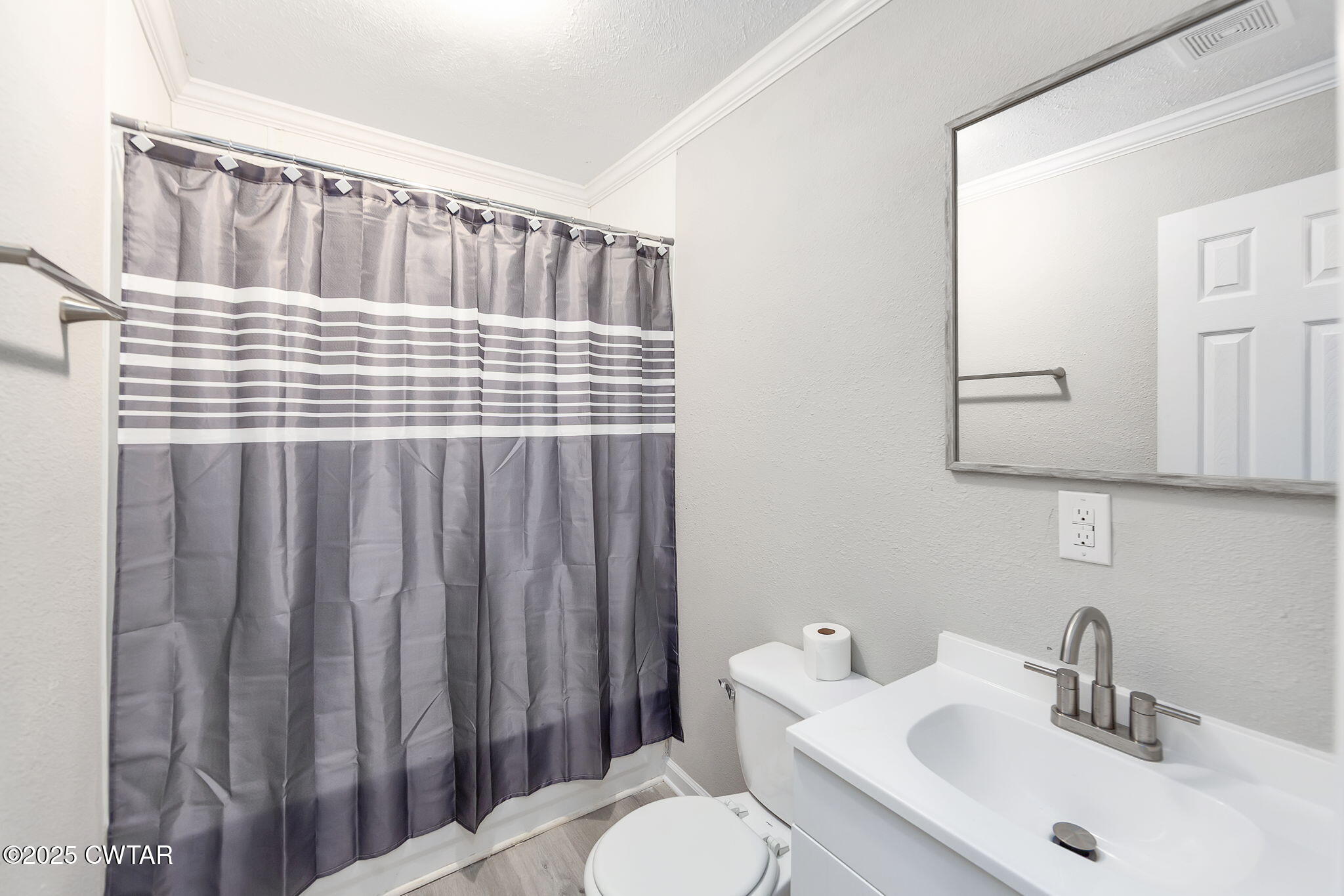 2025 Overton Loop Toone, TN 38381 - Photo 9 of 14 a bathroom with a sink and a toilet