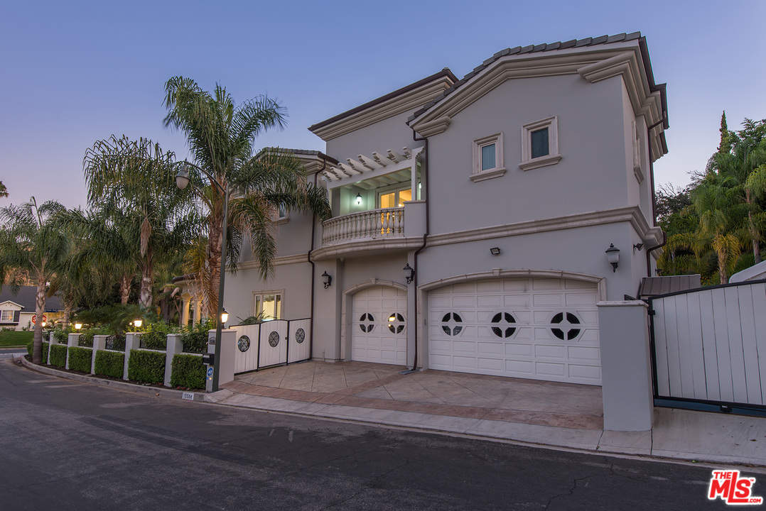 15506 Meadowgate Road Encino, CA 91436 - Photo 50 of 50 a front view of a house with parking