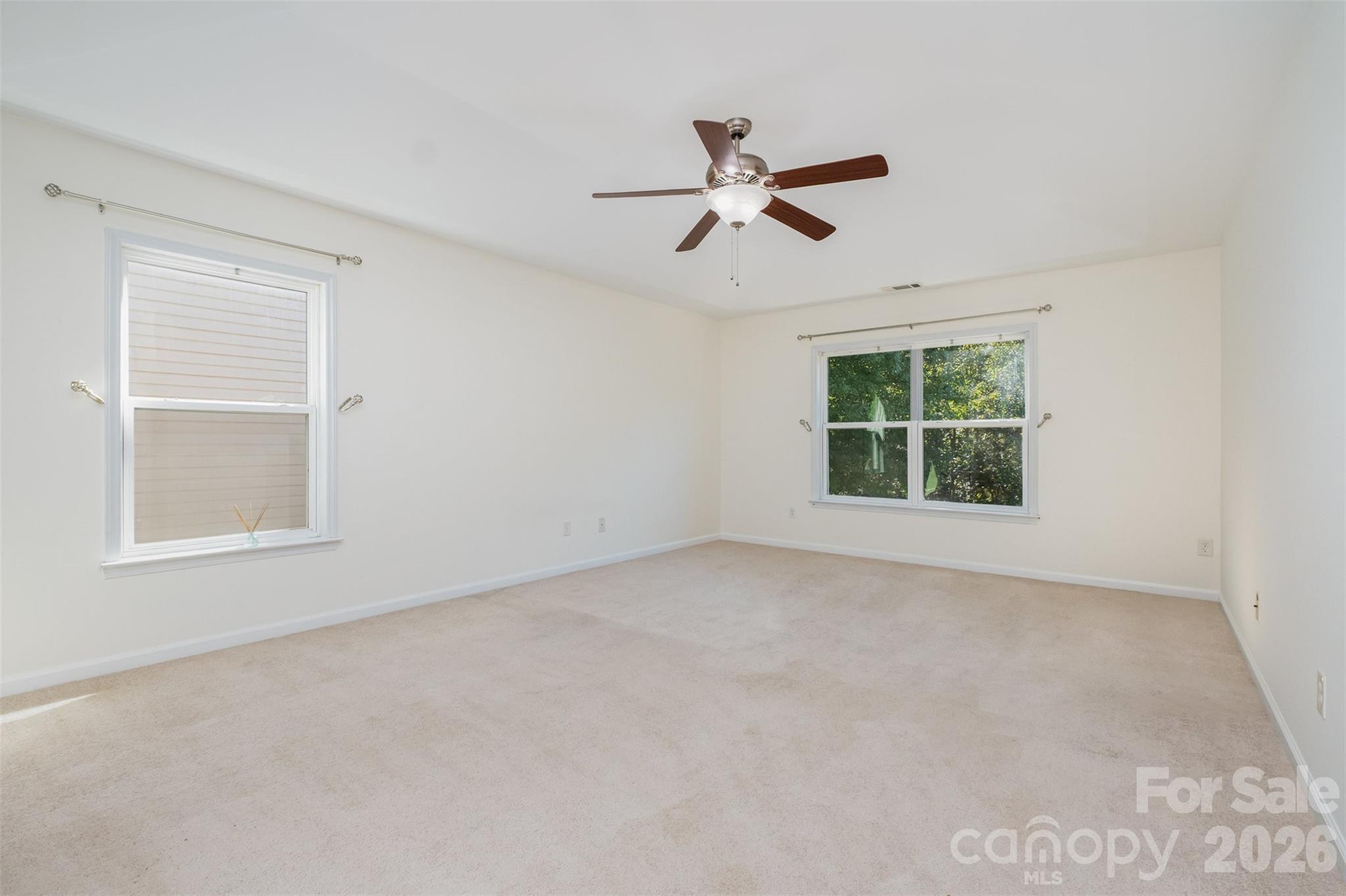 9213 Seamill Road Charlotte, NC 28278 - Photo 19 of 33 an empty room with windows