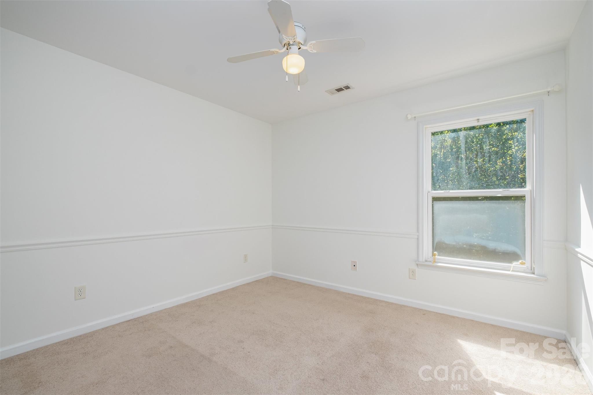 9213 Seamill Road Charlotte, NC 28278 - Photo 26 of 33 an empty room with a window