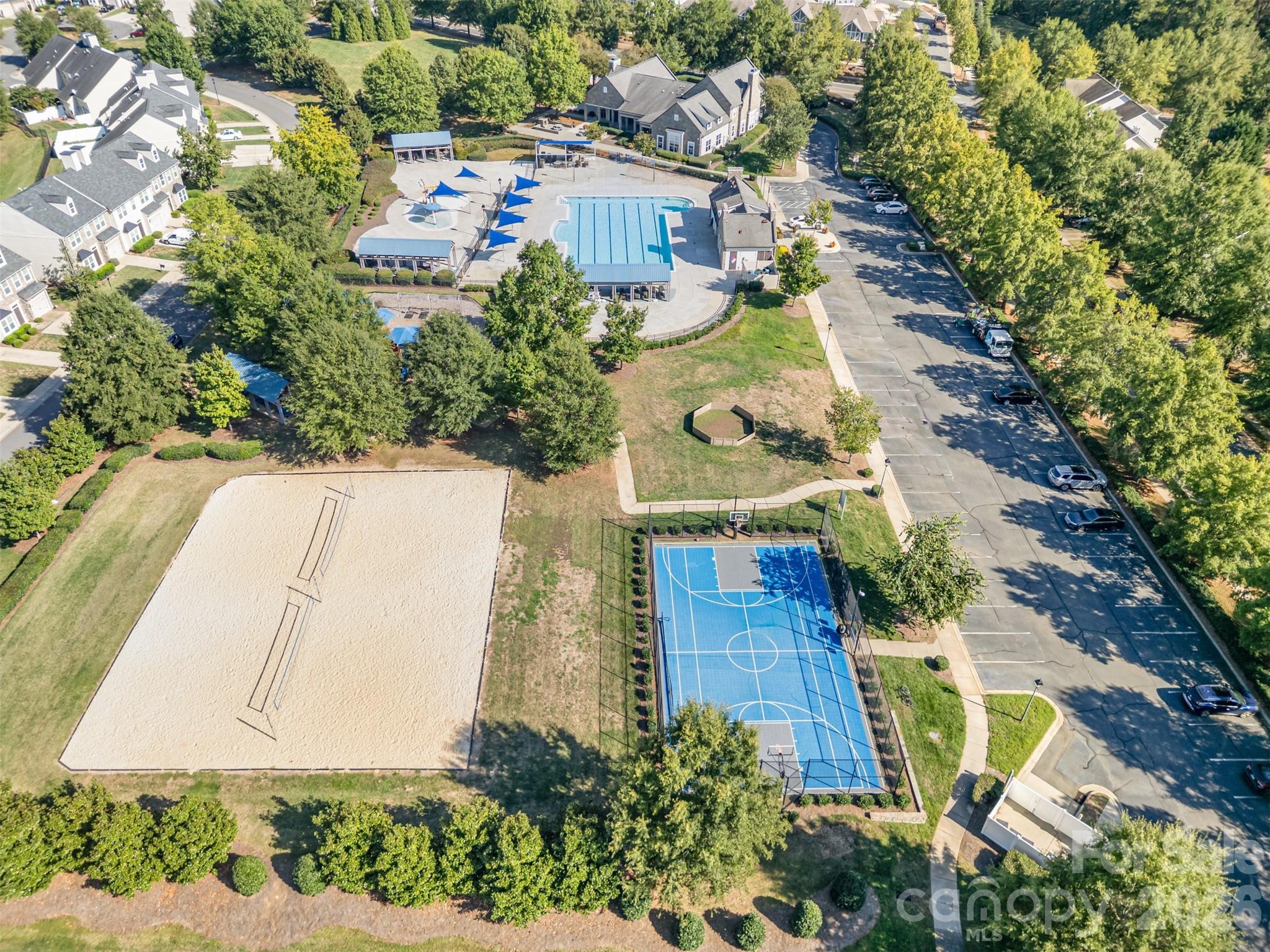 9213 Seamill Road Charlotte, NC 28278 - Photo 31 of 33 an aerial view of a house with a yard and greenery