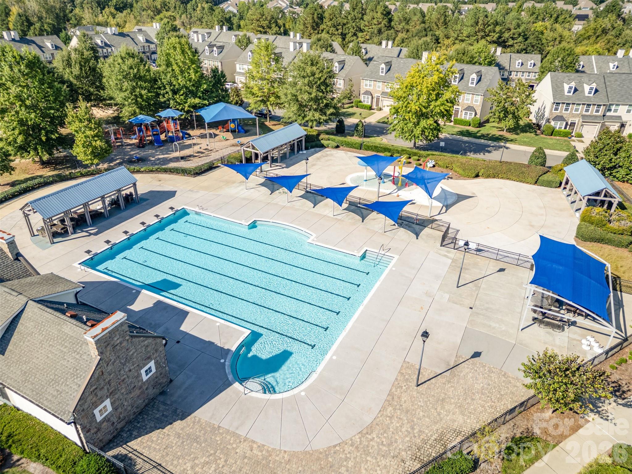 9213 Seamill Road Charlotte, NC 28278 - Photo 32 of 33 an aerial view of a swimming pool with outdoor seating