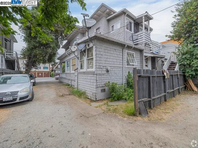 a view of a car park in front of house