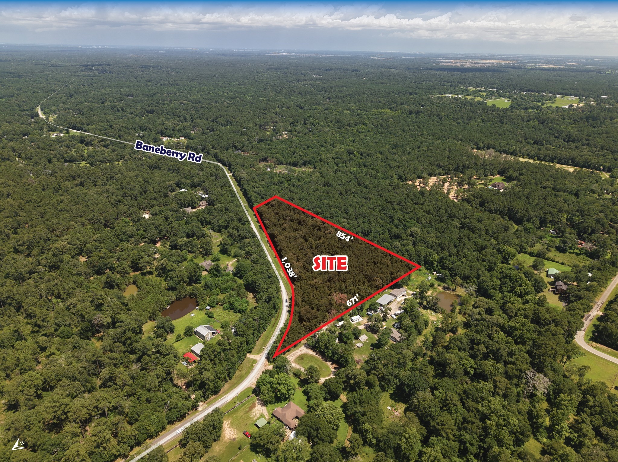 0 Baneberry Road Magnolia, TX 77355 - Photo 2 of 13 a view of a city