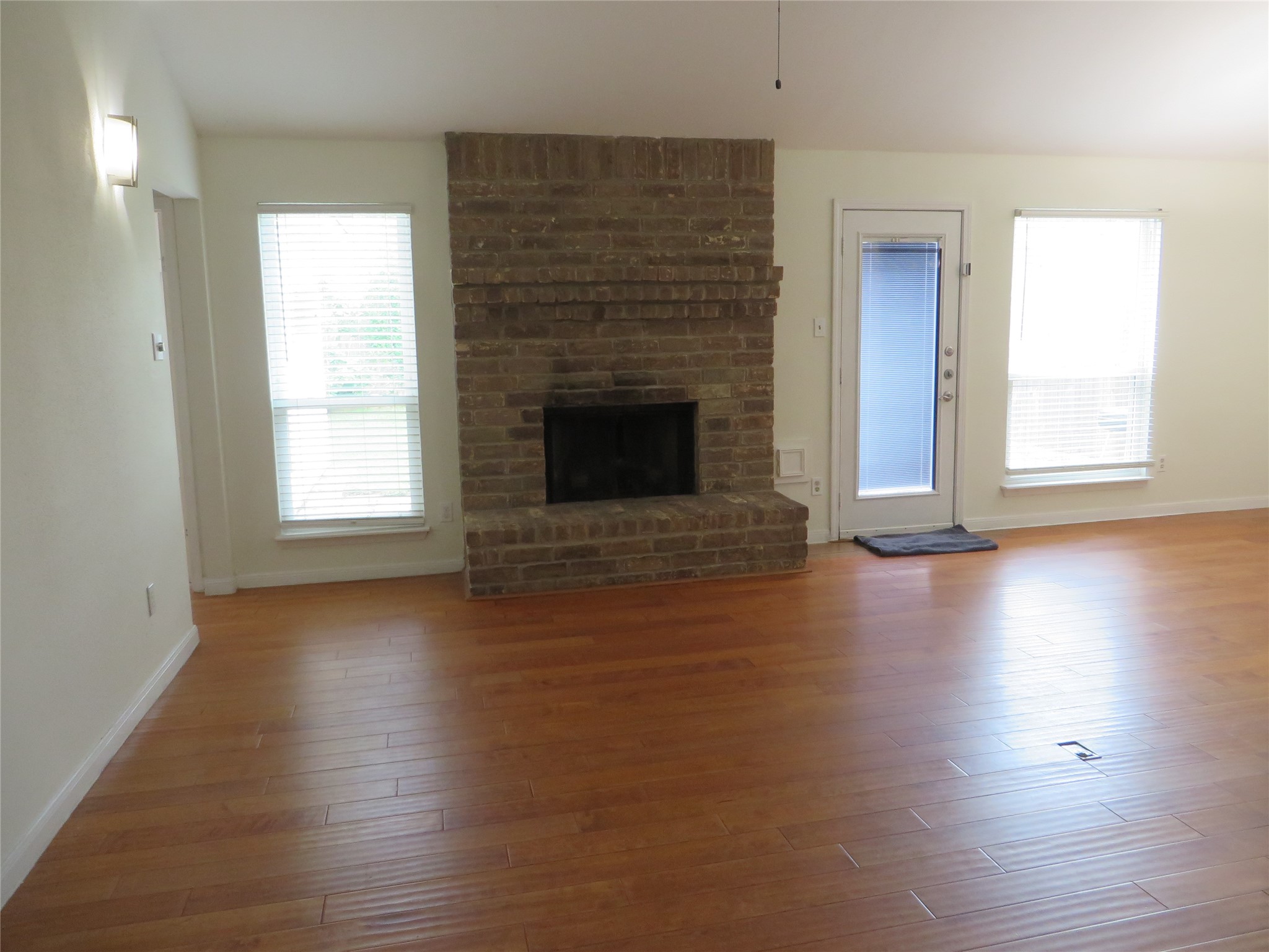 2815 Old Fort Road Sugar Land, TX 77479 - Photo 2 of 12 Engineering wood flooring in spacious family room.