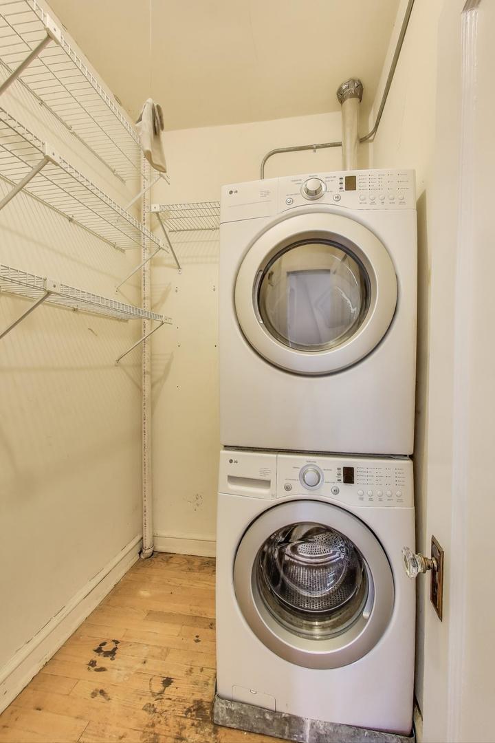 1641 Hinman Avenue, Unit 3 Evanston, IL 60201 - Photo 27 of 30 a utility room with dryer and washer