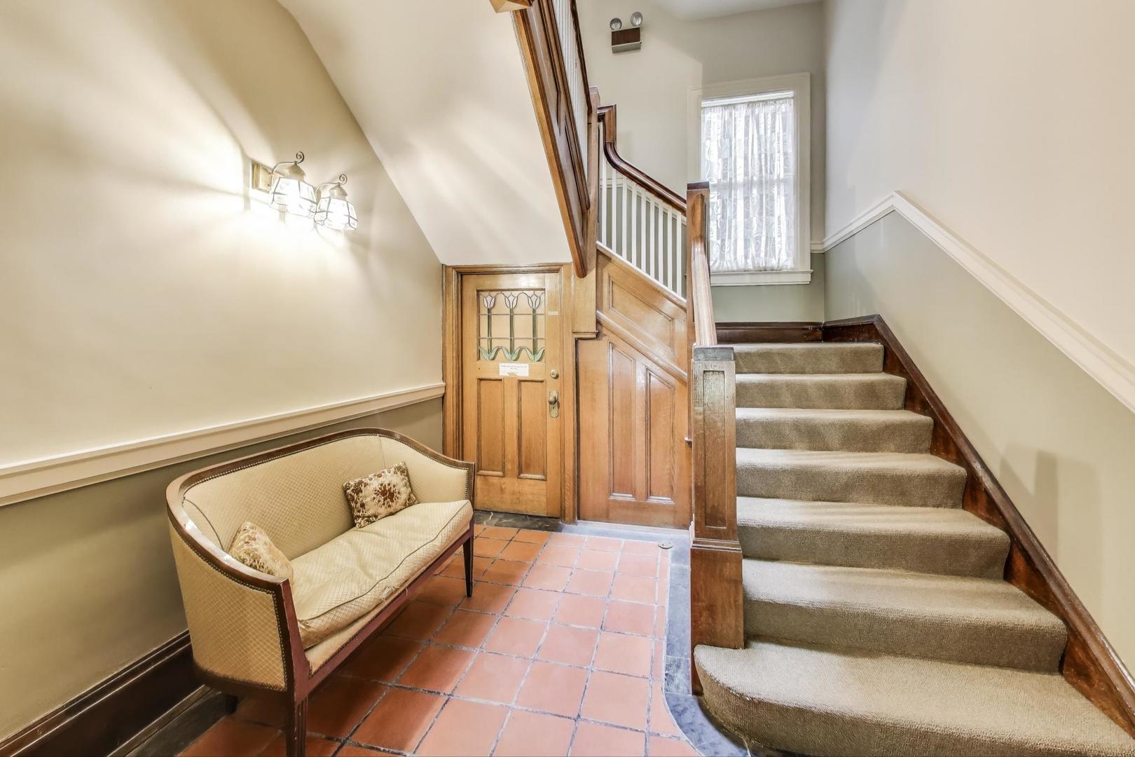 1641 Hinman Avenue, Unit 3 Evanston, IL 60201 - Photo 7 of 30 a view of entryway with furniture and stairs