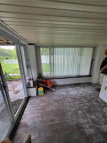 a view of a park with large trees