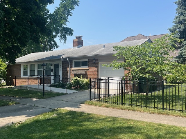1603 Elliott Street Park Ridge, IL 60068 - Photo 2 of 31 a view of a house with a yard and a garden