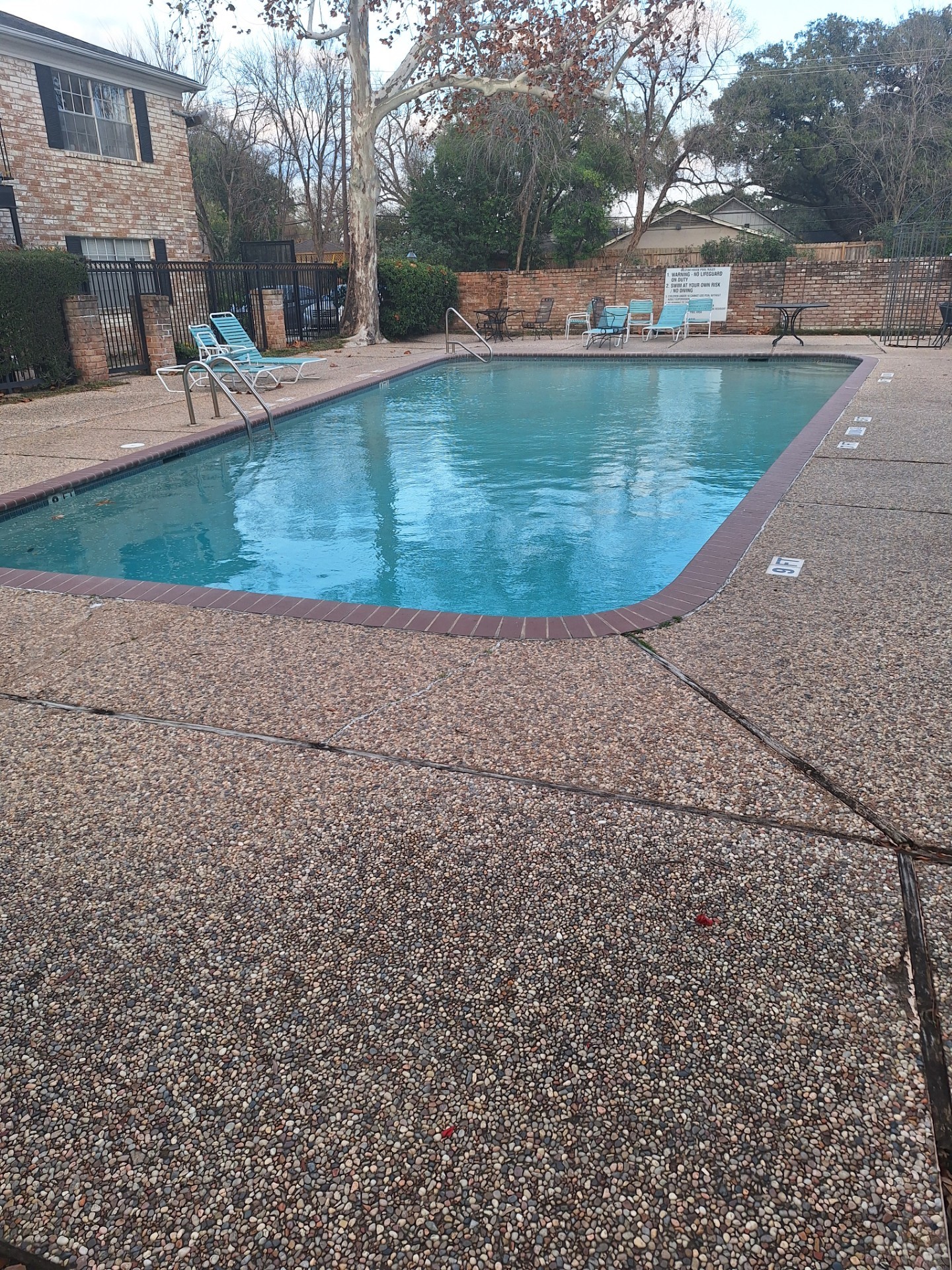 7900 Westheimer Road, Unit 127 Houston, TX 77063 - Photo 2 of 12 front view of a house with a yard